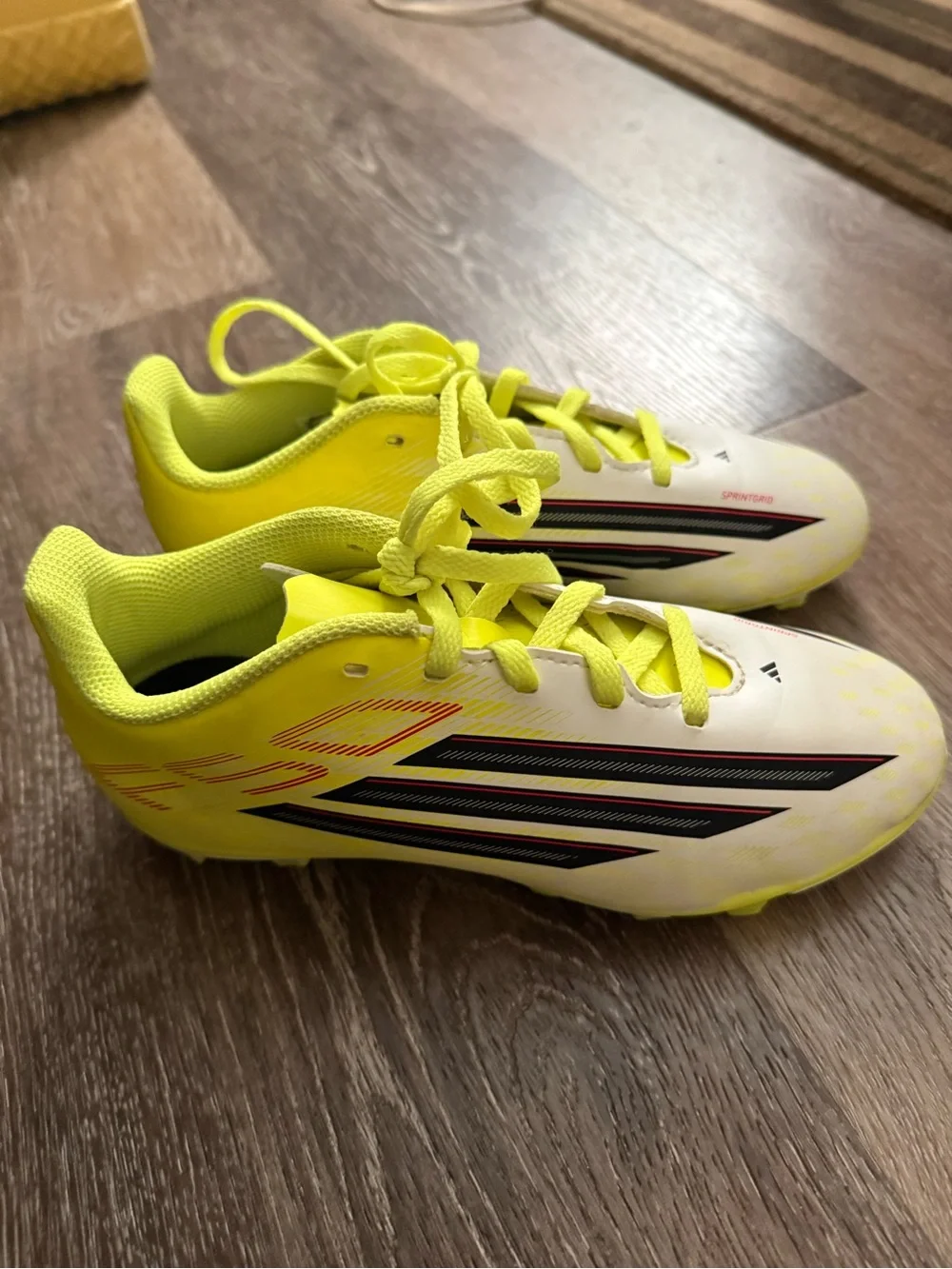 adidas Kids Neon Yellow White Soccer Cleats with Black Stripes